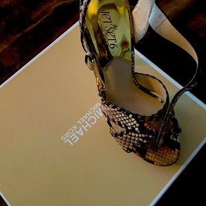 Micheal Kors snake skin practically new heel.  Size 6.5